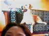 Carmen and her painting Pheasant and Yellow Lab.